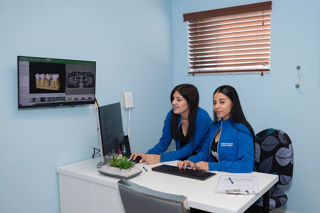 Front desk team reviewing a treatment plan